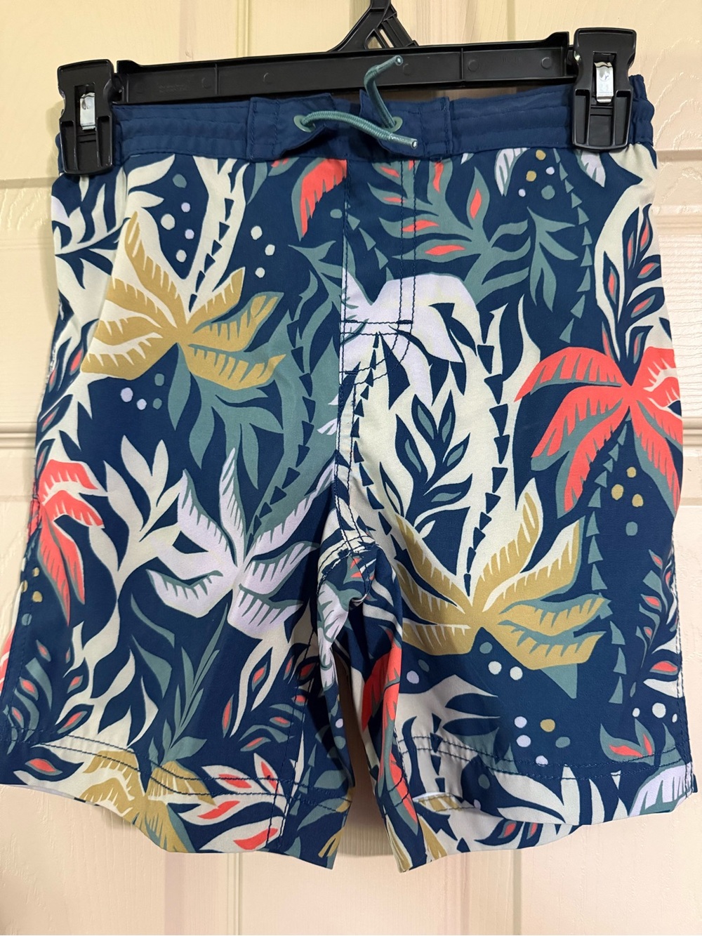 Old Navy Boy’s Navy Tropical Print Swim Shorts with Coral and Gold Accents